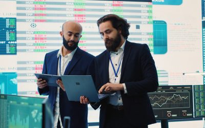 Team of investors analyzing profit amount and making decisions to fund another business project, examine big data on a huge display. Associates verifying efficiency and budget. Camera A.