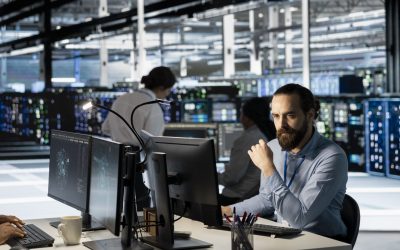 technician-using-pc-data-center-update-server-tech-configuring-equipment-2-2048x1365